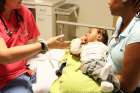 Pediatrician talks with the mother of a child in the emergency room in 2014 at Johns Hopkins Hospital in Baltimore.