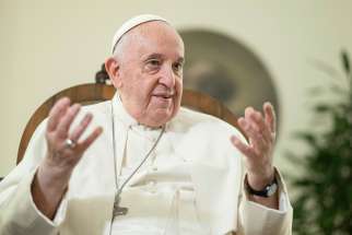 Pope Francis speaks during an interview with the top staff of America magazine at the Vatican Nov. 22, 2022.