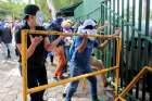 Protesters block the entrance of the Central American University during a Nov. 19, 2019, protest against Nicaraguan President Daniel Ortega&#039;s government in Managua, the capital. Supporters of Ortega Nov. 21 tried to enter St. John the Baptist Parish in Masaya, just south of Managua, forcing churchgoers to barricade the doors with pews.