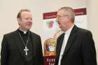 Archbishops Eamon Martin of Armagh, Northern Ireland, and Diarmuid Martin of Dublin chat during an Oct. 22, 2016 news conference.