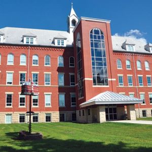 A new elevator gives a fresh look to the west side of the refurbished St. Peter’s College. A miniature bird house in the shape of Michael Hall was designed and built by Miners Construction, project manager for the renovations. 