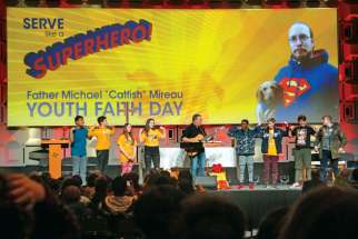 Cheering, singing and praying, students celebrate Father Michael “Catfish” Mireau Youth Faith Day in Edmonton. 