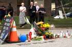 Auxiliary Bishop Edward M. Rice of St. Louis visited the Ferguson, Mo., site of 18-year-old Michael Brown&#039;s shooting in this photo dated Aug. 17.  Catholic schools in the Ferguson area were already prepared in case the grand jury ruling comes down with classes in session.