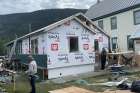 Work crews do repairs to the rectory at St. Mary’s Church in Dawson City, Yukon. In addition to upgrades and repairs for missionary parishes, Catholic Missions In Canada supports missionary sustenance, Canadian seminarians, lay leader formation and religious education initiatives.