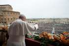 Pope Francis greets the crowd during his Easter message and blessing &quot;urbi et orbi&quot; (to the city and the world) from the central balcony of St. Peter&#039;s Basilica at the Vatican April 21, 2019. 