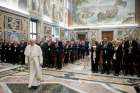 Pope Francis arrives for a meeting with members of the Italian Catholic Union of the Press at the Vatican&#039;s apostolic palace Sept. 23, 2019. Journalists need to be able to distinguish good from evil and see how their reporting can actually shape the world, not just describe what has happened, Pope Francis said. Reporters can also help &quot;unmask words that are false and destructive,&quot; and make sure their sources are credible, he added.