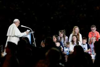  Pope Francis speaks to families during the Festival of Families in Croke Park stadium in Dublin Aug. 25. 