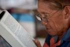 A woman reads the Bible Sept. 5, 2019, in St. Ignatius, Guyana.