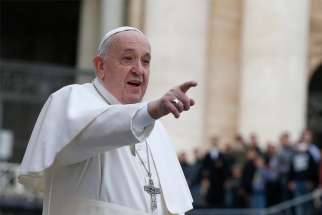 Pope Francis gestures as he arrives to lead his general audience in St. Peter&#039;s Square at the Vatican Feb. 26, 2020.