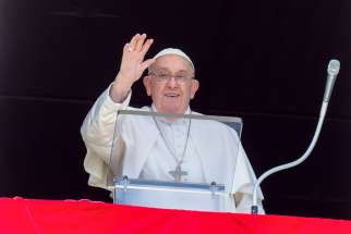 Pope Francis greets visitors gathered in St. Peter&#039;s Square to pray the Angelus at the Vatican Aug. 25, 2024.