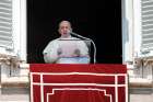 Pope Francis leads the Angelus from the window of his studio overlooking St. Peter’s Square at the Vatican, Sept. 13.