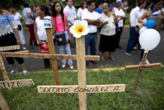  People in Managua, Nicaragua, pay tribute Oct. 28 to those who lost their lives in protest against President Daniel Ortega. 