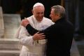 Pope Francis embraces Father Luigi Ciotti, founder of the Italian anti-Mafia group Libera, at the Church of St. Gregory VII in Rome March 21, during a prayer service for crime victims of the Mafia.