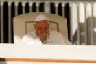 Pope Francis places his hand on his face during his weekly general audience in St. Peter&#039;s Square at the Vatican Oct. 11, 2023.