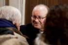 Archbishop Charles Scicluna of Malta speaks with members of the Catholic community inside a church in Osorno, Chile, June 14.