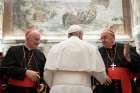 Pope Francis is flanked by Cardinal Marc Ouellet, prefect of the Congregation for Bishops, and Cardinal Leonardo Sandri, prefect of the Congregation for Eastern Churches, Sept. 12, 2019, during an audience with bishops who were ordained over the past year and were attending a course sponsored by the two congregations.