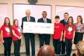 The cheque presentation to “Mega Strong,” the group of Bishop Ryan students that showcased the Multiple Sclerosis society, with Hamilton Mayor Bob Bratina (centre left), principal Hermon Mayers, representative Steve Humphreys from the Toskan Casale Foundation, and fundraising co-ordinator Kaitlyn Kinsella from the Hamilton chapter of the Multiple Sclerosis Society of Canada.