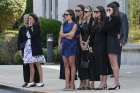 Jane Gaudreau, second from left, mother of Johnny and Matthew Gaudreau, and Meredith Gaudreau, middle in blue, widow of Johnny Gaudreau, a winger with the Columbus Blue Jackets hockey team, watch with family and friends as a hearse carries away the casket of Johnny Gaudreau, following the funeral Mass for him and his brother at St. Mary Magdalen Church in Media, Pa., Sept. 9, 2024. The brothers died after being hit by a drunk driver while riding bicycles in New Jersey Aug. 29. Not only is Meredith pregnant, so is Matthew&#039;s widow, Madeline, who is expecting the couple&#039;s first child.