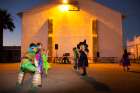 Students dressed in costumes attend the annual Halloween carnival at Santa Cruz Catholic School in Tucson, Ariz., Oct. 24.