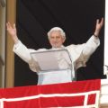 Pope Benedict XVI greets the crowd after praying the &quot;Regina Coeli&quot; from the window of his apartment overlooking St. Peter&#039;s Square at the Vatican April 22. The Pope said preparing children to receive first Communion should be done with both great zeal and moderation.