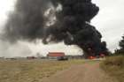 Smoke rises from a military base in Lamu County, Kenya, Jan. 5, 2020, after the Somali extremist group al-Shabab said it attacked the base. One American service member and two U.S. defense contractors were killed.