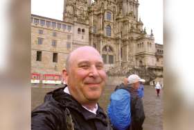 Dr. Robin Vose in front of the Metropolitan Archcathedral Basilica of Santiago de Compostela in Galicia, Spain.