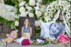 Danforth shooting victims, Reese Fallon, 18, and Julianna Kozis, 10, are honoured with flowers and candlelight at a Danforth Av. vigil July 25.  