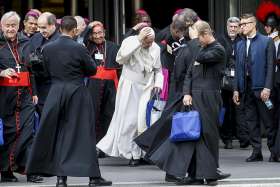 Pope Francis leaves at the end of the final session of the Synod of Bishops on young people, the faith and vocational discernment at the Vatican Oct. 27, 2018.