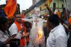 Hindu nationalists are pictured in a recent photo burning an effigy of Cardinal Telesphore Toppo, archbishop of Ranchi, India, Sept. 2017.