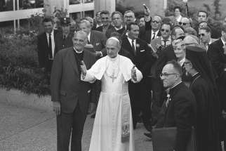 Pope Paul VI stands next to Eugene C. Blake, general secretary of the World Council of Churches, as he arrives at the headquarters of the WCC in Geneva June 10, 1969. Pope Francis is scheduled to attend an ecumenical prayer service and meeting at the WCC during a one-day visit to Geneva June 21. 