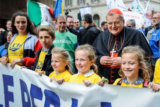 Cardinal Raymond L. Burke walks in the ninth national March for Life in Rome May 18, 2019. He resigned from the Dignitatis Humanae Institute June 25, saying it had become &quot;more and more identified with the political program&quot; of Steve Bannon.