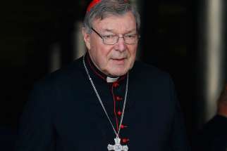 Australian Cardinal George Pell is seen in this Oct. 6, 2014 file photo at the Vatican. The Australian cardinal called for an inquiry into the leaking of accusations that he is under police investigation for the alleged abuse of minors. 