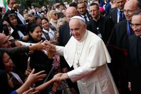 Pope Francis greets the faithful as he arrives to celebrate Mass at the Church of the Immaculate Conception in Baku, Azerbaijan, Oct. 2, 2016.