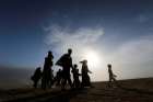 People return to their village near Mosul, Iraq, after it was liberated from Islamic State militants Oct. 21.