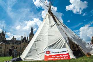 A teepee stands in front of Parliament in Ottawa. A new papal statement on the Doctrine of Discovery is expected soon.
