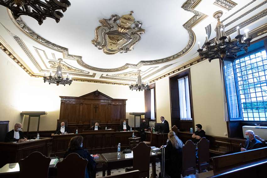 This Oct. 14, 2020, file photo shows the Vatican City State criminal court during the opening of the trial of Father Gabriele Martinelli and Msgr. Enrico Radice. Father Martinelli is accused of repeatedly sexually abusing a younger student at the Vatican&#039;s St. Pius X Pre-Seminary. Msgr. Enrico Radice, former rector of the seminary, has been accused of obstructing the investigation into the younger priest. Defendants in the court are normally seated on the bench at right. 