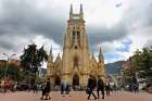 People walk in front of Our Lady of Lourdes Church in Bogota, Colombia, March 1. Vatican spokesman Greg Burke confirmed July 7 that Pope Francis will beatify Bishop Jesus Emilio Jaramillo Monsalve of Arauca and Father Pedro Ramirez Ramos during his September visit to the South American nation.