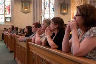 Women praying at St. Michael&#039;s Cathedral during a diaconate ordination ceremony in 2012. Bob Brehl it is time to rethink the role of women in Church.