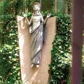 A statue of the Virgin Mary stands outside “the UN church,” Holy Family Church in New York.