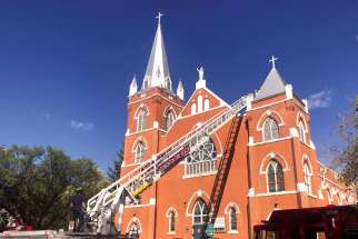 Firefighters respond to an Aug. 30 fire at Sacred Heart Church of the First Peoples in Edmonton. No one was injured in the blaze and the cause is under investigation.