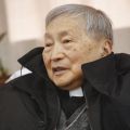 Chinese Bishop Aloysius Jin Luxian of Shanghai died April 27 at age 96. He is pictured meeting with visitors from the U.S. in this 2007 file photo. Bishop Jin, who spent decades in prison and work camps in atheist China, later negotiated a delicate balan ce between the country&#039;s state-sponsored church and the Vatican.