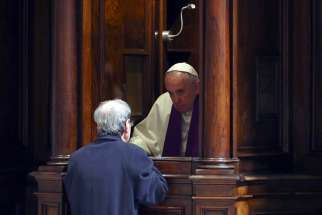 Pope Francis hears confession during a penitential liturgy in early March in St. Peter&#039;s Basilica at the Vatican. During his Aug. 2 Angelus, Pope Francis told people not to be afraid or ashamed to go to confession.
