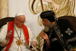 Pope Francis and Coptic Orthodox Pope Tawadros II attend an ecumenical prayer service at St. Peter&#039;s Church in Cairo April 28.