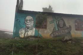 An image of Bishop Samuel Ruiz Garcia of San Cristobal de Las Casas, Mexico, is seen Jan. 22 painted on a church in Acteal. Long before Pope Francis spoke of a poor Church for the poor and taking the Church to the peripheries, Ruiz built the Church in Mexico’s southern Chiapas state