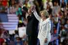 Democratic presidential nominee Hillary Clinton smiles with her vice presidential running mate Sen. Tim Kaine after accepting the nomination on the fourth and final night at the Democratic National Convention in Philadelphia on July 28, 2016.