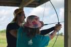 Jake Woodcroft mentors a young camper in archery at the Catholic Youth Organization’s Camp Marydale. Woodcroft and Ontario summer camps are awaiting final word on whether camps will reopen for 2021. Premier Doug Ford has said they will but no details have been announced as the camping season draws near.