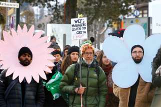 Climate change activists protest during the World Economic Forum annual meeting in Davos, Switzerland, Jan. 21.