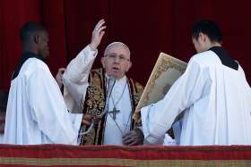  Pope Francis delivers his Christmas blessing &quot;urbi et orbi&quot; (to the city and the world) from the central balcony of St. Peter&#039;s Basilica at the Vatican Dec. 25. 