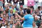 A volunteer talking to the youths at the Youth Rally in Rocton, Ontario. 