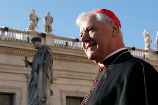 Cardinal Gerhard Muller, then-prefect of the Congregation for the Doctrine of the Faith, is pictured before Pope Francis&#039; general audience in St. Peter&#039;s Square at the Vatican in this Nov. 19, 2014, file photo.